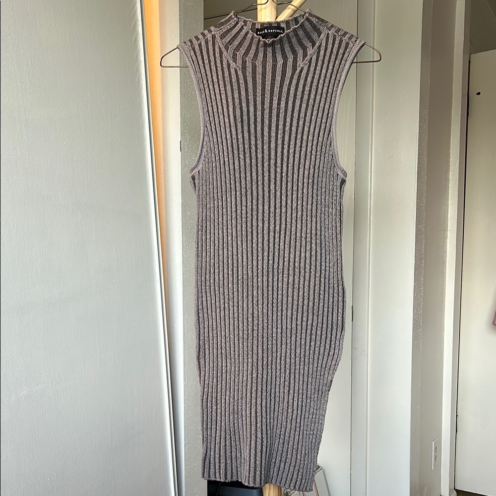 Women’s long sleeveless mock neck sweater